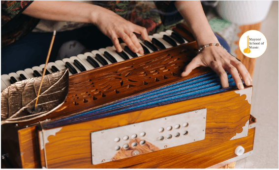 how to play harmonium